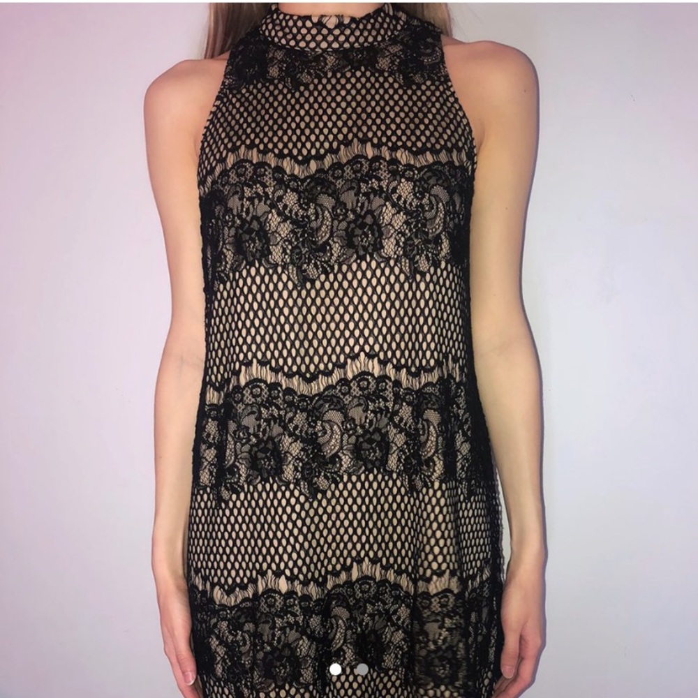 Sleeveless turtleneck dress